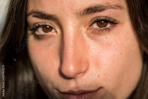 Beautiful brown eyes of a young girl