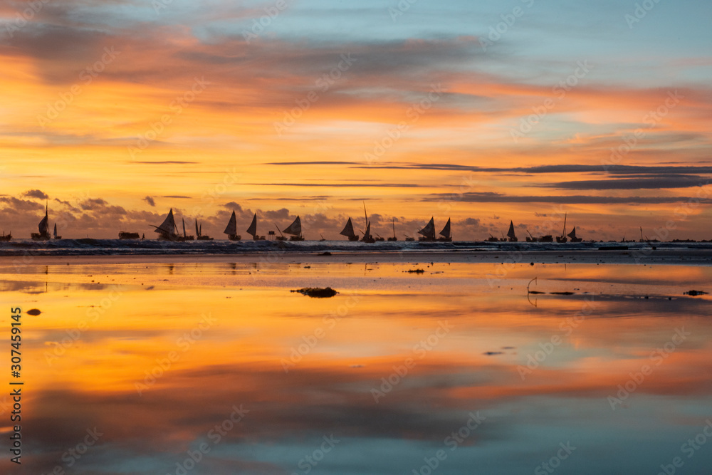 Reflection of the sky in the sea shore and fisherman¥s rafts Reflection of the sky in the sea shore and fisherman¥s rafts