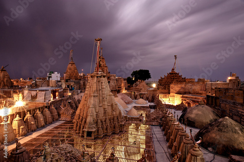 High angle view of Jaisalmer fort and Jain temples domes at night photo