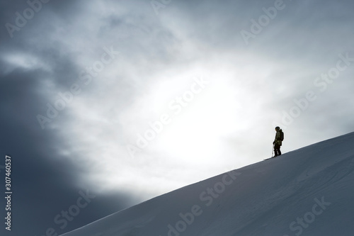 Man off-piste skiing photo