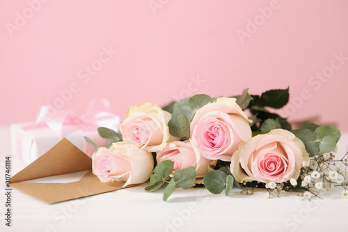 flowers and gifts on the table. March 8 concept, mother's day, womens day, birthday.