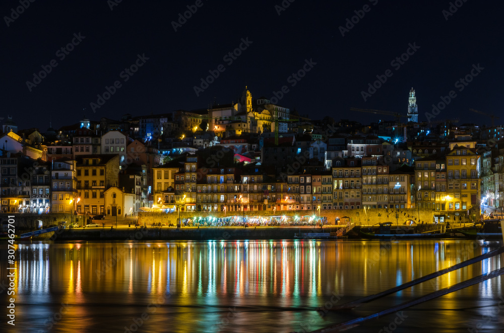 Night view on the Ribeira disctrict and wine boats from the Villa Nova de Gaia dock