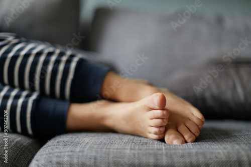 boys feet on sofa