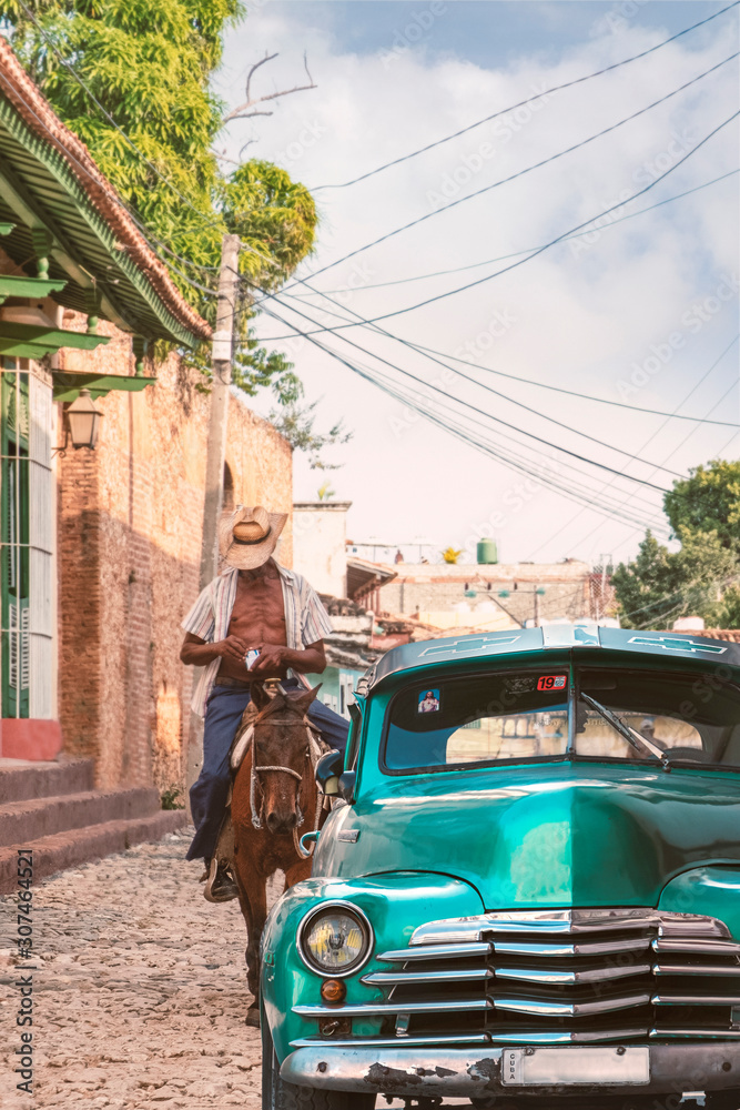 Cuba classic car with horse rider Stock Photo Adobe Stock