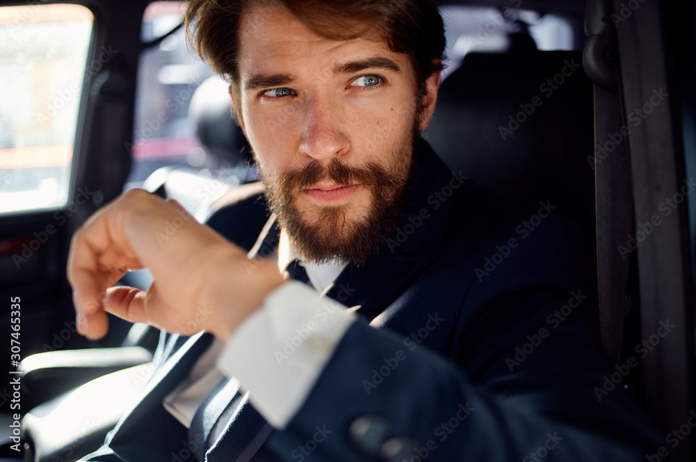 portrait of a young man in car