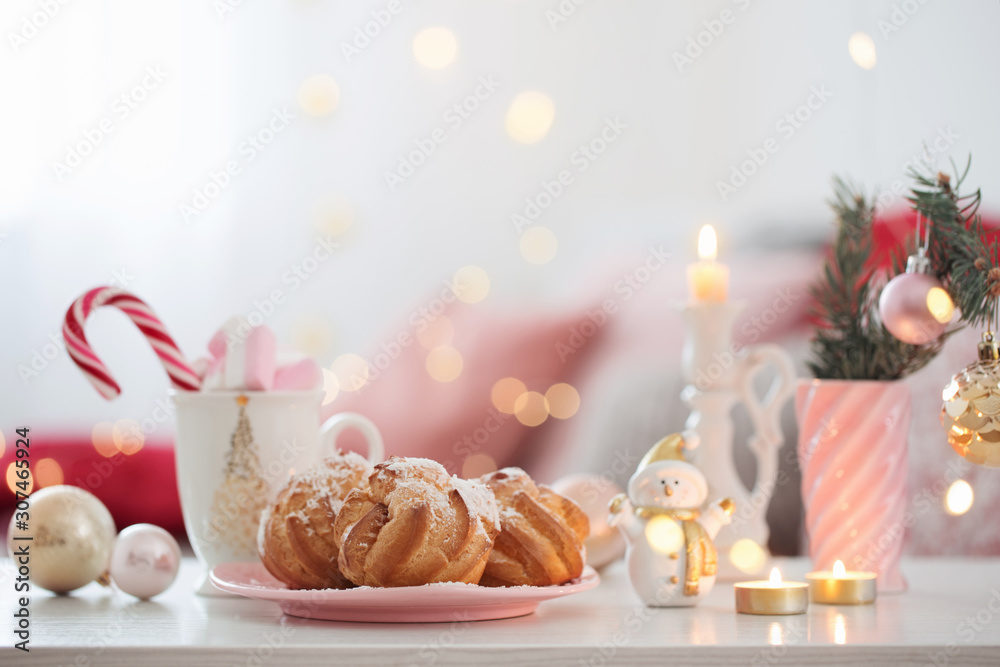 cocoa with marshmallow and christmas decor in pink and gold colors cocoa with marshmallow and christmas decor in pink and gold colors