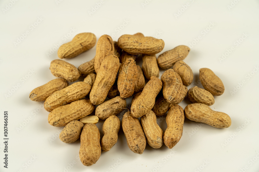 pile of peanuts isolated on white background pile of peanuts isolated on white background