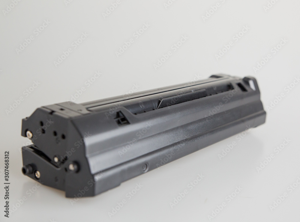 London, England, 10/09/2019 Black Laser Toner Cartridge for modern printer technology, Isolated one a white background shot professional in a studio. Modern engineering and technology for household London, England, 10/09/2019 Black Laser Toner Cartridge for modern printer technology, Isolated one a white background shot professional in a studio. Modern engineering and technology for household