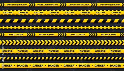 Caution tape set of yellow and black ribbons, for dangerous area, accident, police. Vector tape template with shadow on dark background. © viktoria_ngm