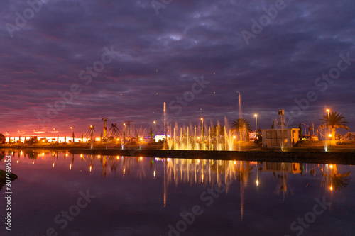 Beautiful fountain at sunset day on exposure in the city of Batumi, Georgia. © Underwater girls