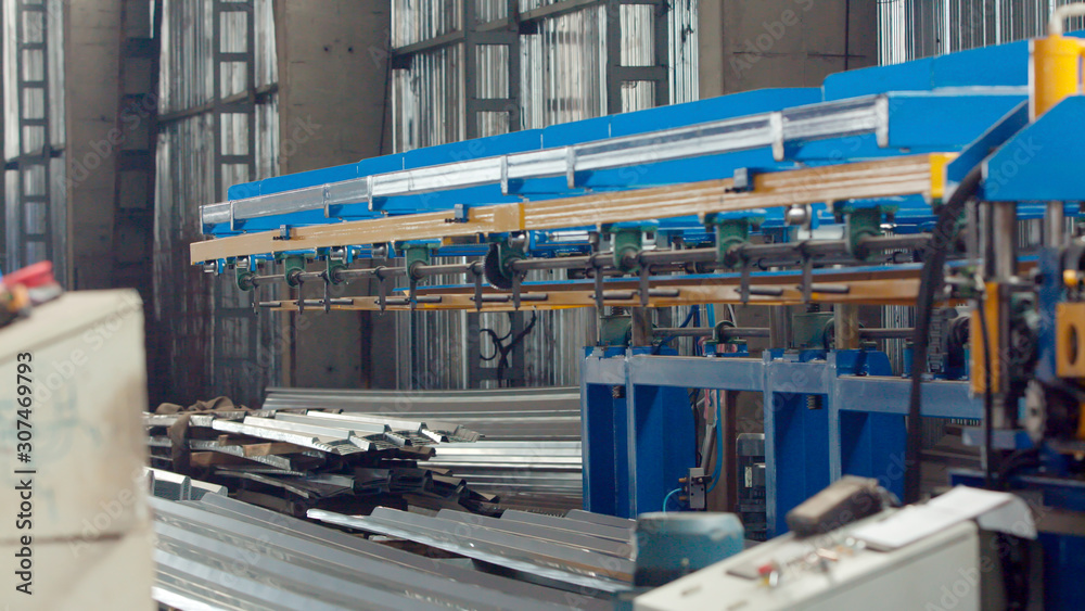 Sheet metal bending machine in the production plant