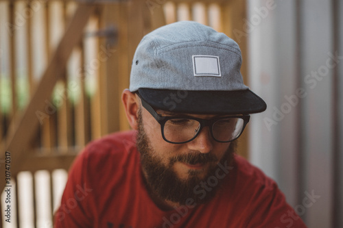 Young man wearing baseball cap photo