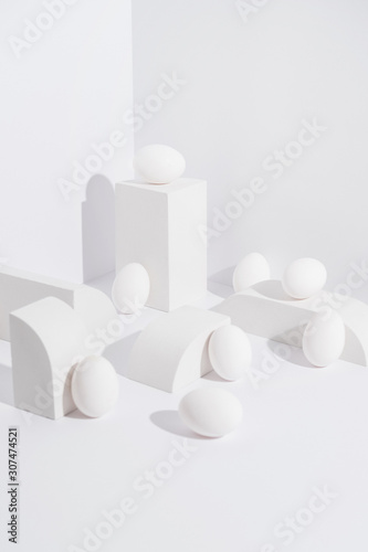 Eggs In White Abstract Setup.