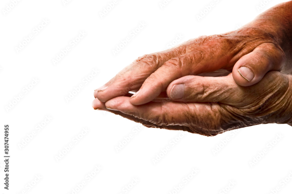 Fototapeta premium Good old mother's hands on a light background close-up.