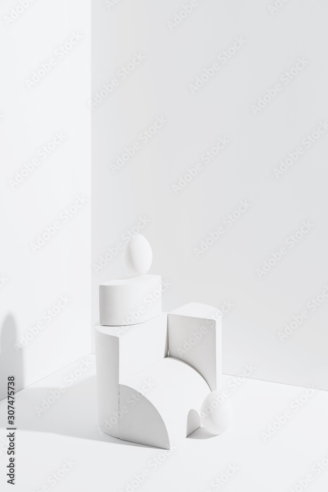 Eggs In White Abstract Setup.