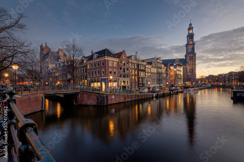 Westerkerk and Anne Frank house at sunset photo