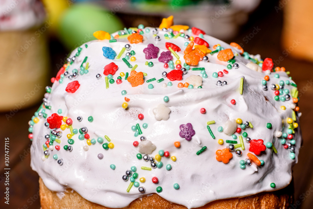 Easter cake and colorful eggs on a dark background Easter cake and colorful eggs on a dark background