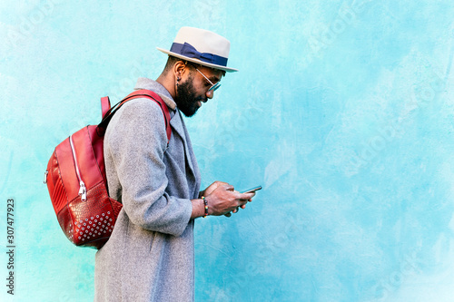 African man using mobile phone photo