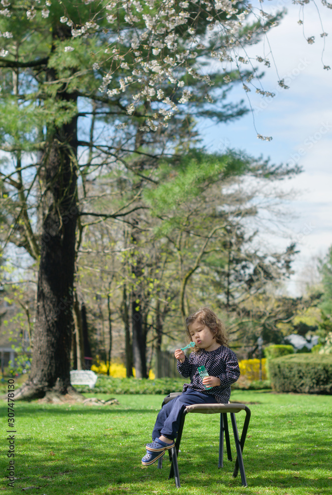 Little girl enjoying outdoors Little girl enjoying outdoors