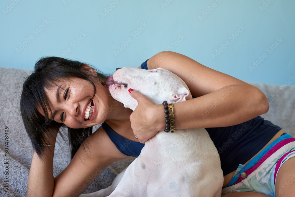 © Daxiao Productions/Stocksy - Loving moment between dog and owner