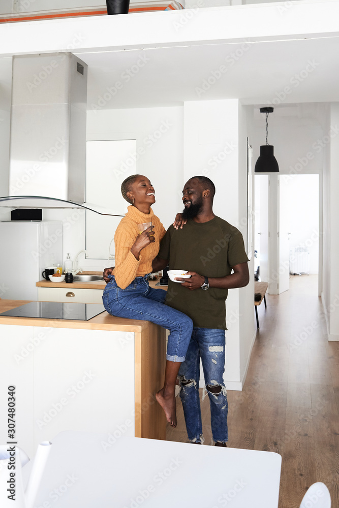 Cheerful black afro couple kitchen. Cheerful black afro couple kitchen.