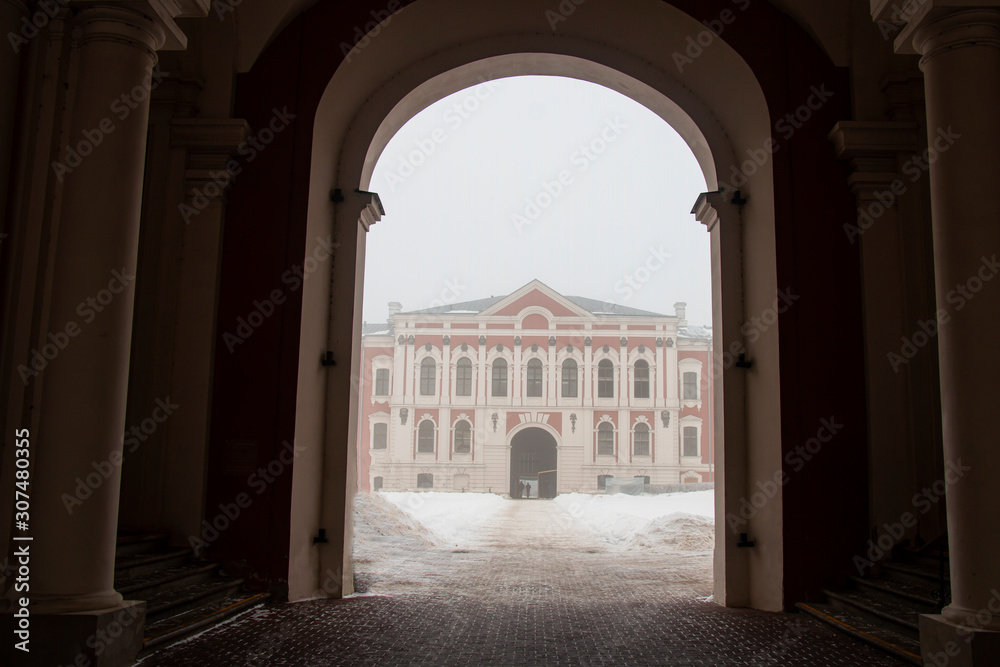 Jelgava Palace arch entrance in winter. The palace is the largest baroque palace in the Baltic countries, currently the Latvian Agricultural University.