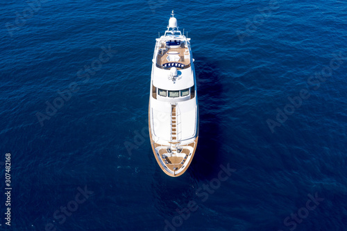 High angle shot of a big schooner sailing in the blue ocean