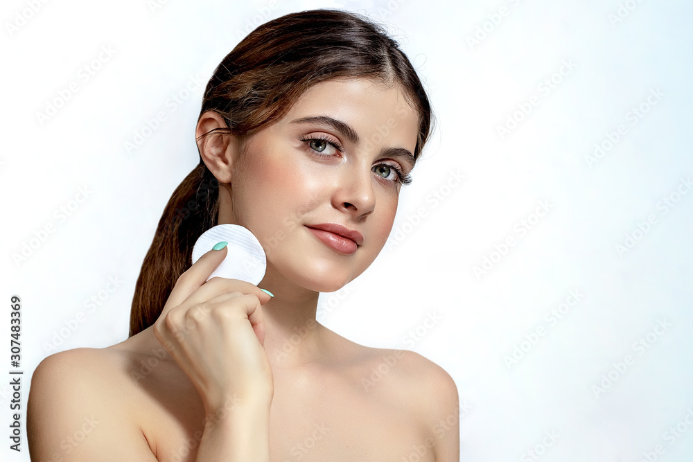 Beautiful young woman with clean perfect skin. Beautiful young woman with clean perfect skin.