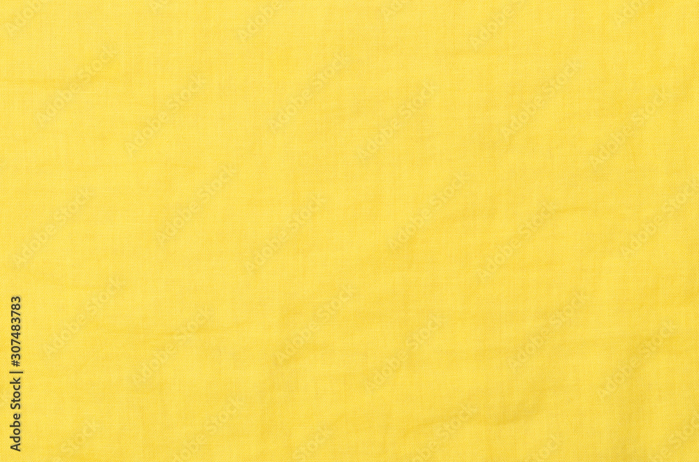 Fototapeta premium close up yellow cotton fabric background