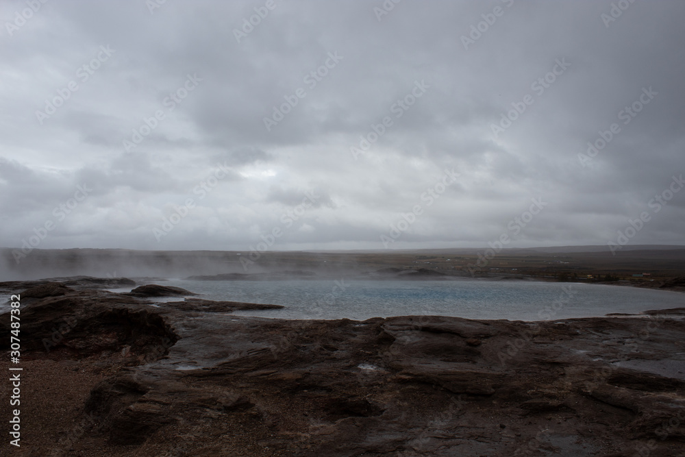 The original geysir in Iceland on a cloudy day The original geysir in Iceland on a cloudy day