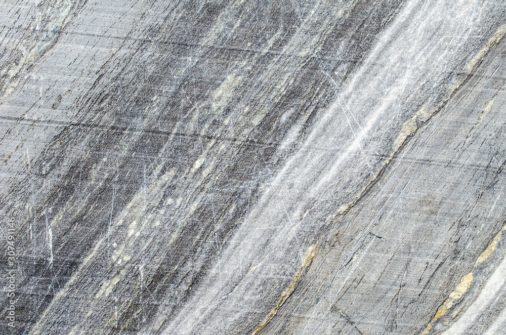 Texture of white and gray marble. Rough stone surface. Monochrome background.Marble wall. Texture of white and gray marble. Rough stone surface. Monochrome background.Marble wall.