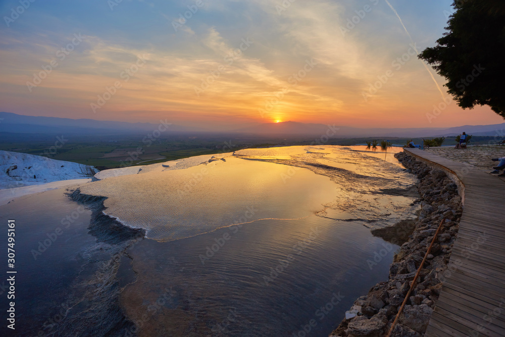 Obraz premium Natural travertine pools and terraces at sunset - Pamukkale