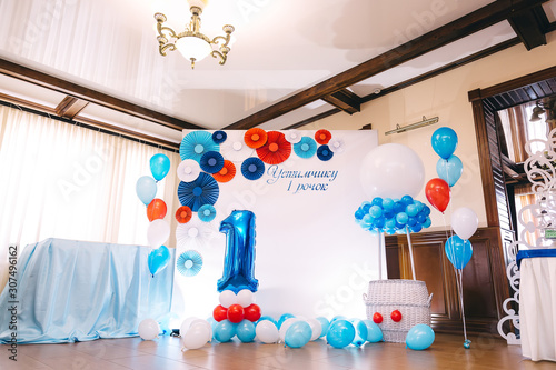 A beautiful composition of helium balloons and wall with paper d