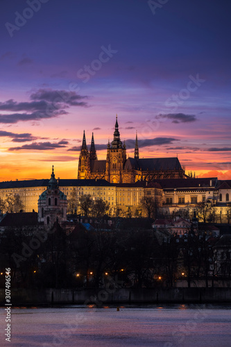 Roman Catholic Metropolitan Cathedral of Saints Vitus, Wenceslaus and Adalbert in Prague with colorful sunset and free copy space for your text