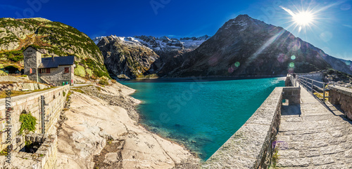 Gelmer Lake near by the Grimselpass in Swiss Alps, Gelmersee, Switzerland photo