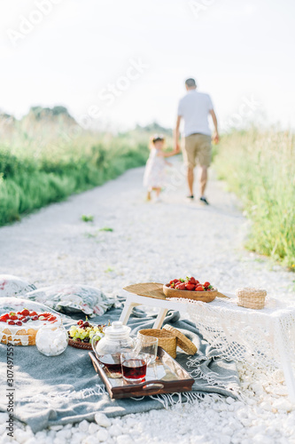 father and daughter walking