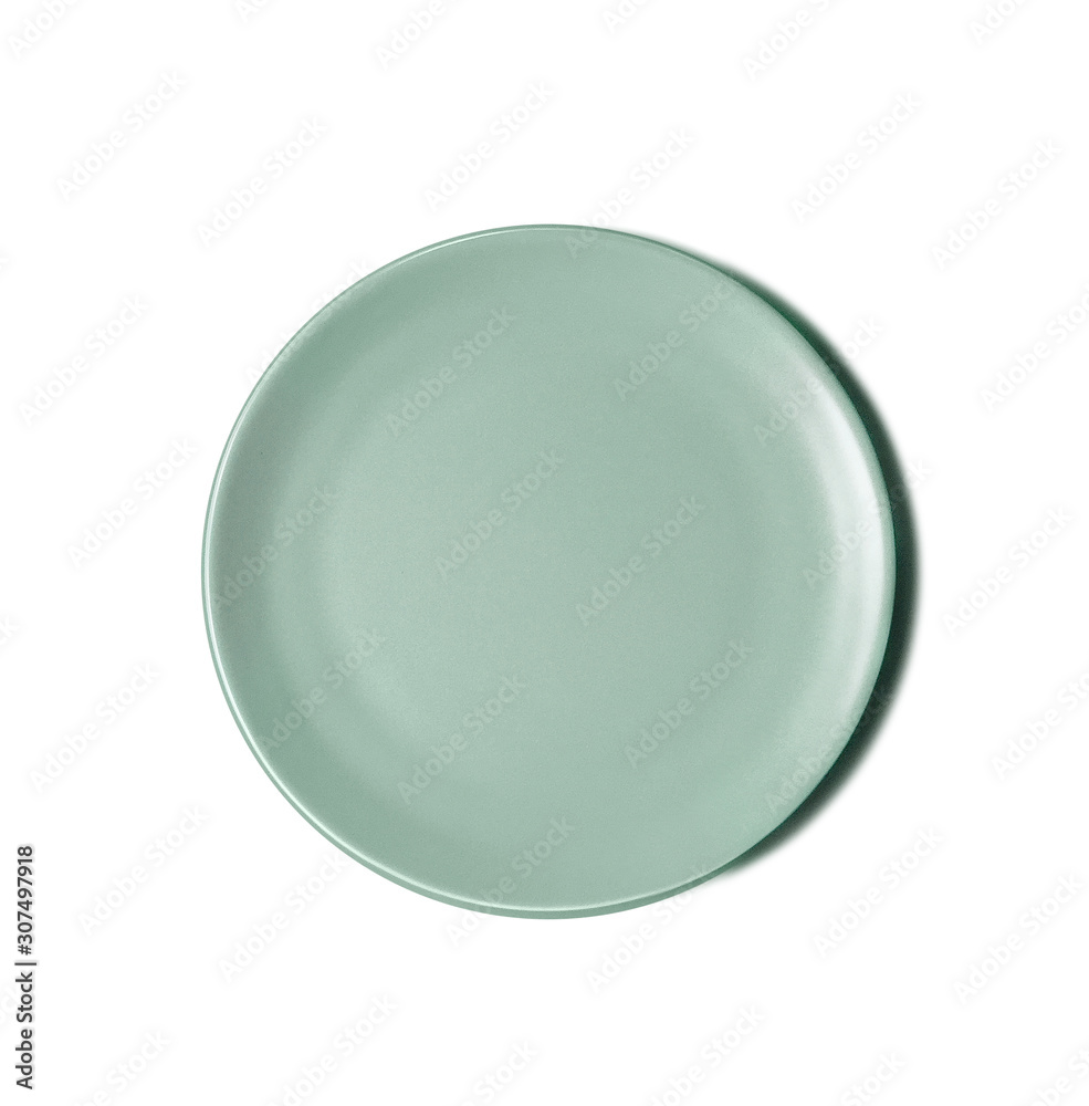 New luxury cutlery view from above on a isolated white background. Top view. Porcelain green saucer. Trendy plate pastel shades. Flat lay view. New luxury cutlery view from above on a isolated white background. Top view. Porcelain green saucer. Trendy plate pastel shades. Flat lay view.