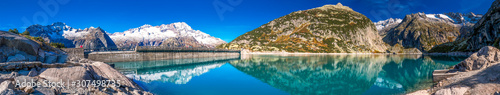 Gelmer Lake near by the Grimselpass in Swiss Alps, Gelmersee, Switzerland photo