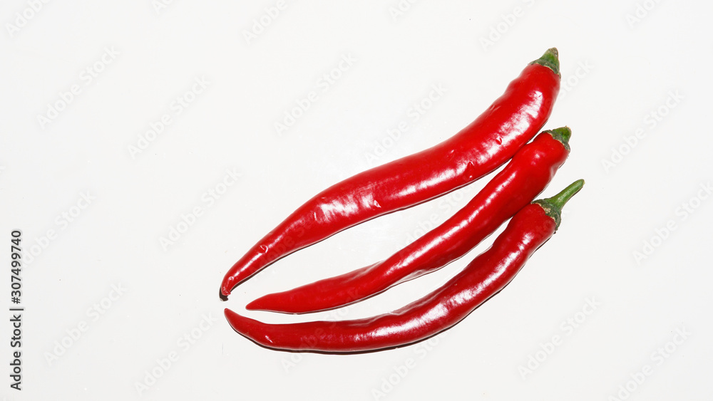 red chili peppers isolated on white background red chili peppers isolated on white background