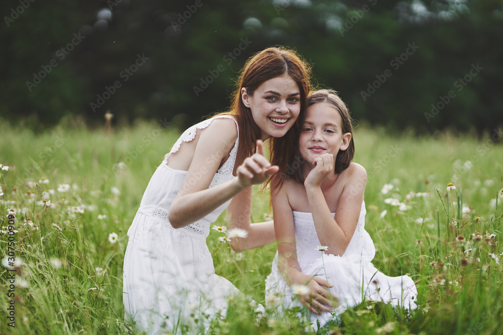 mother and daughter in the park mother and daughter in the park