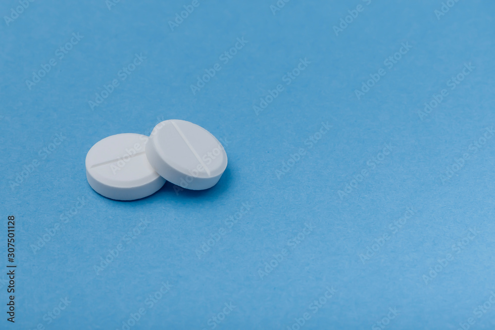 Two pills on a blue background, medicine, Two pills on a blue background, medicine,
