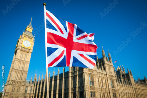Photography Single Union Jack flag waving in front of Big Ben at the Houses of Parliament in