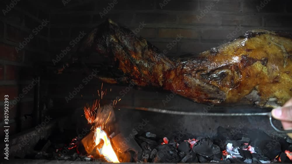 lamb carcass roasted on a spit, Sheep On Spits Roasting, Roasting whole lamb on spit, lamb carcass roasted on a spit, Sheep On Spits Roasting, Roasting whole lamb on spit,