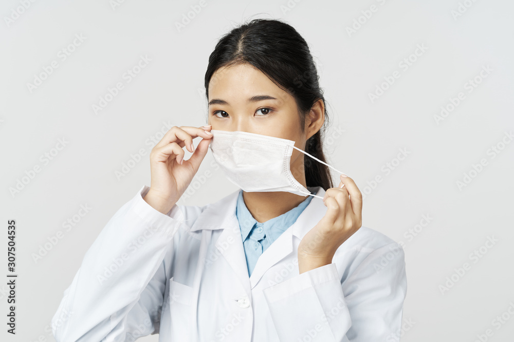 young woman in medical mask