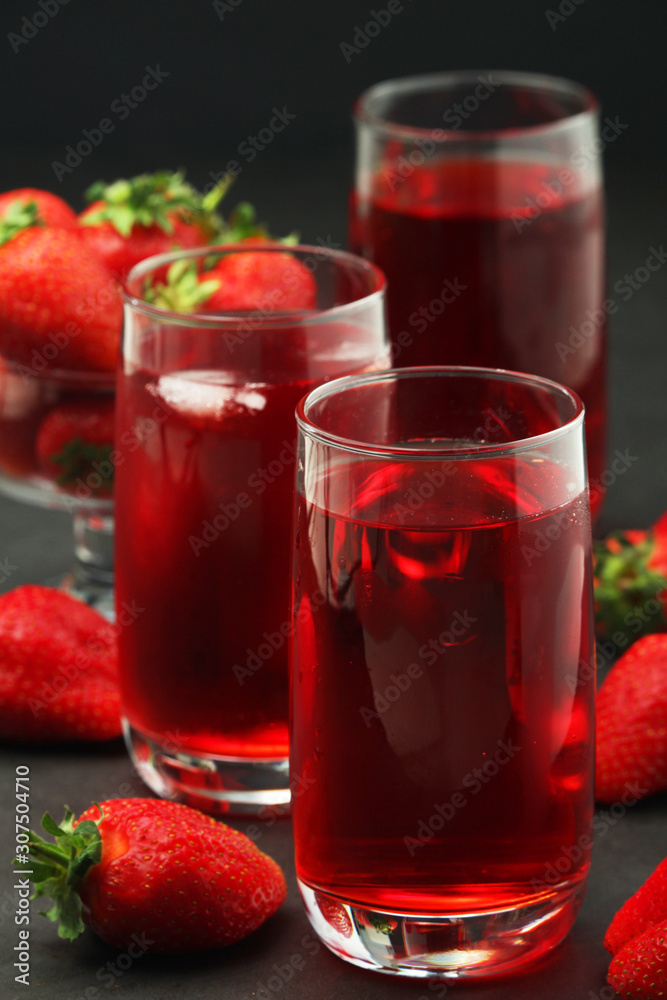 Glasses with strawberry drink with ice Glasses with strawberry drink with ice