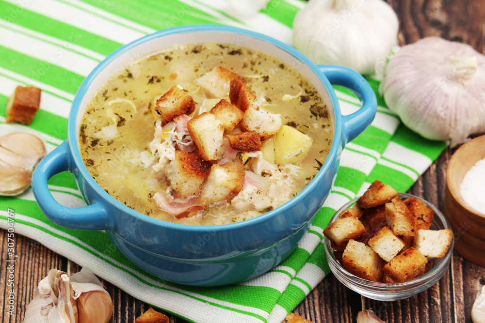A bowl with traditional Czech garlic soup cesnecka A bowl with traditional Czech garlic soup cesnecka