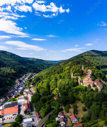 Aerial view of Zwingenberg Castle on mountain against blue sky in town, Hesse, Germany © Westend61