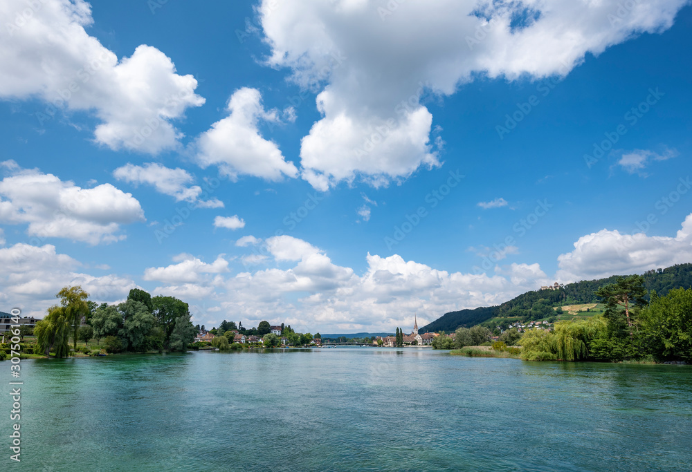 Scenic view of river against blue sky at Stein am Rhein, Switzerland Scenic view of river against blue sky at Stein am Rhein, Switzerland