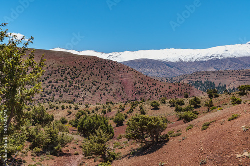 View of the high snow-capped mountains in the Aït Bouguemez valley in Morocco