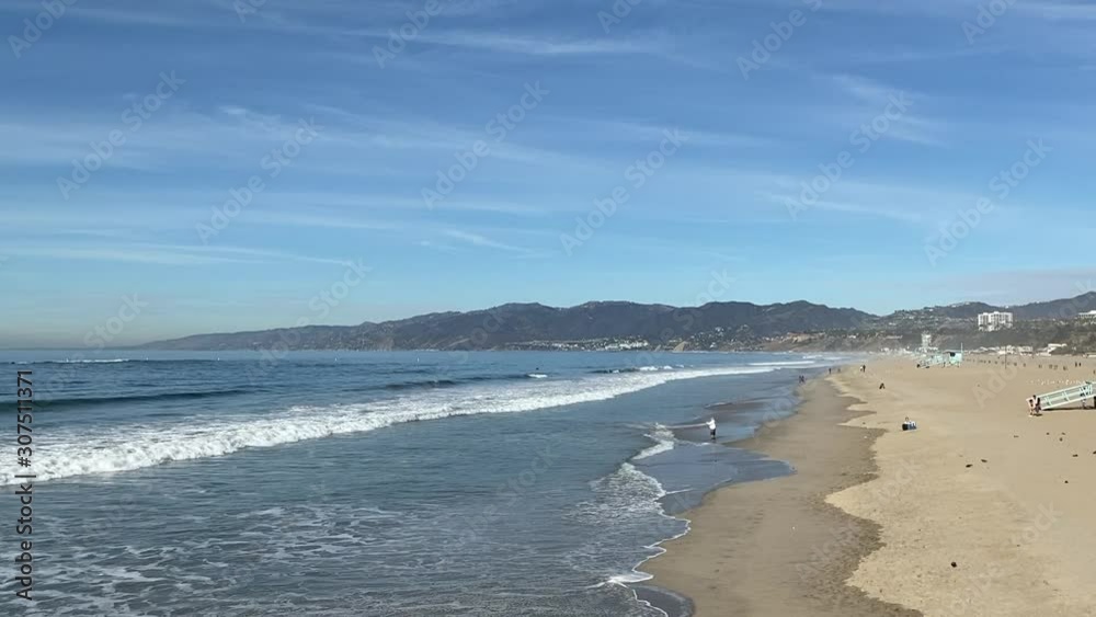 Santa Monica Beach and Pacific Ocean with Santa Monica Mountains in background. Santa Monica Beach and Pacific Ocean with Santa Monica Mountains in background.